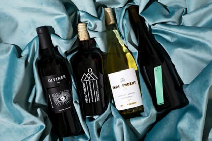 Winc bottles of wine in bed